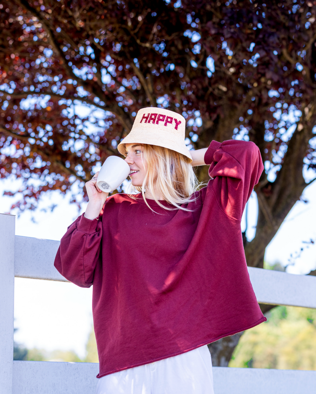 HAPPY HAT IN CHERRY POUR